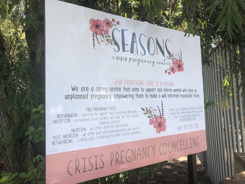 Cartellone pubblicitario di Seasons all’interno dello Stellenbosch Hospital | Christi Nortier/Daily Maverick